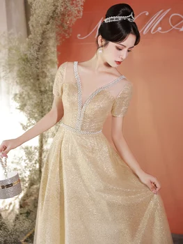 שמפניה שמלות ערב אור יוקרה פנינים V-צוואר באורך רצפת שמלת נשף 2023 מבריק סלים רשמית צד שמלות
